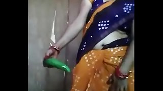 Desi Aunty Playing with cucumber